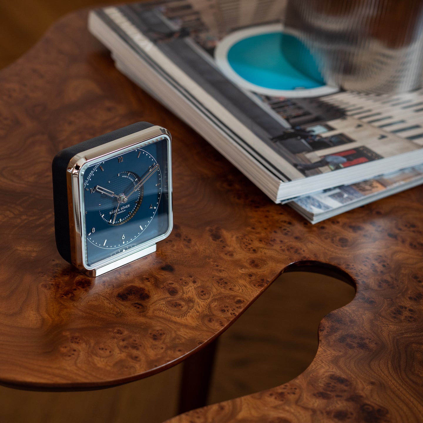 Northern Lights' alarm clock, the blue leather band capturing the essence of a clear night sky