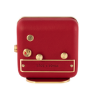 The back view of 'French Kiss' alarm clock, with brushed gold-plated steel and vivid red leather