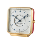 Elegant 'French Kiss' alarm clock with a white dial, blued numbers, and Tapisserie pattern