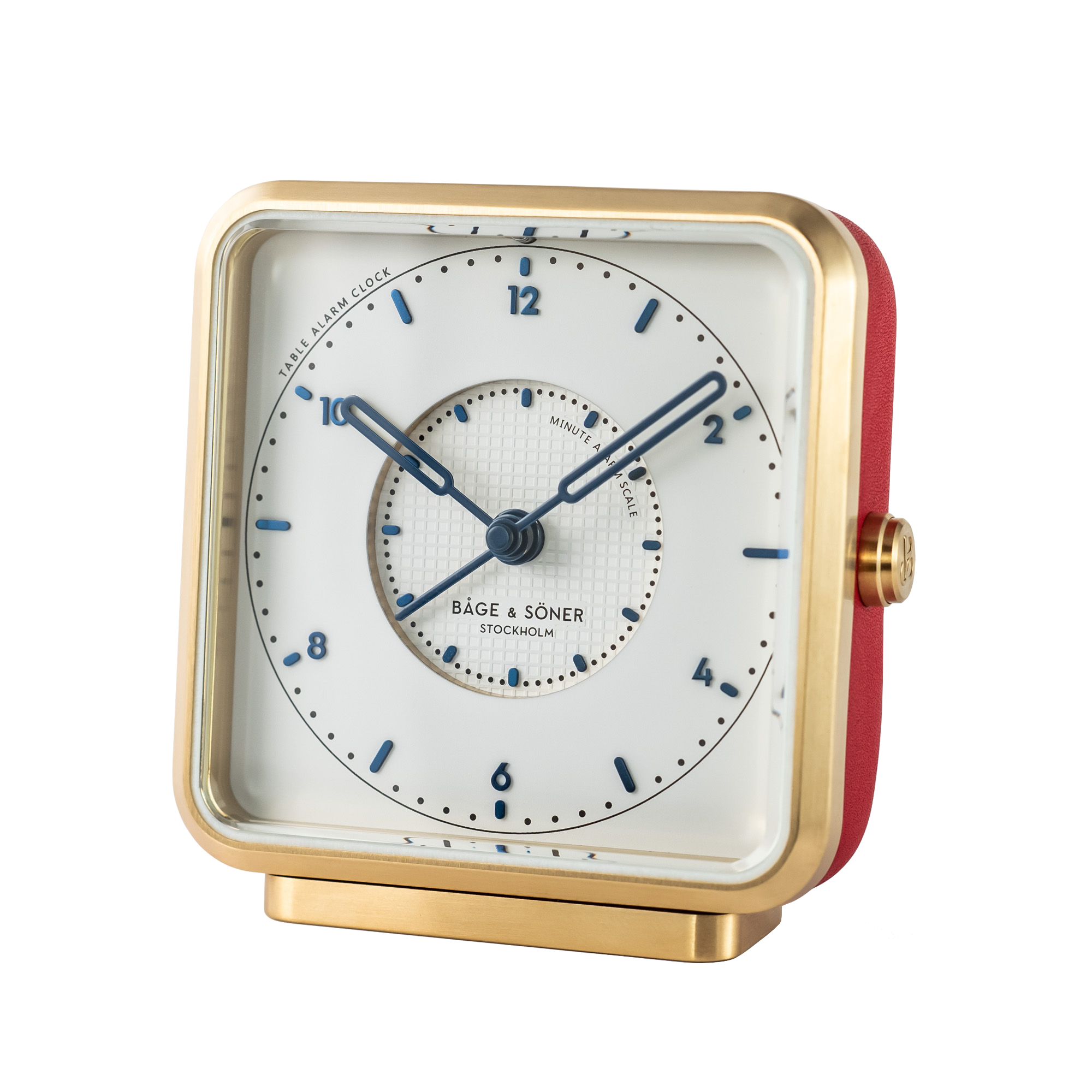 Elegant 'French Kiss' alarm clock with a white dial, blued numbers, and Tapisserie pattern