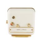 Back view of 'Morning Glory' alarm clock, highlighting the pristine white leather and gold-plated steel