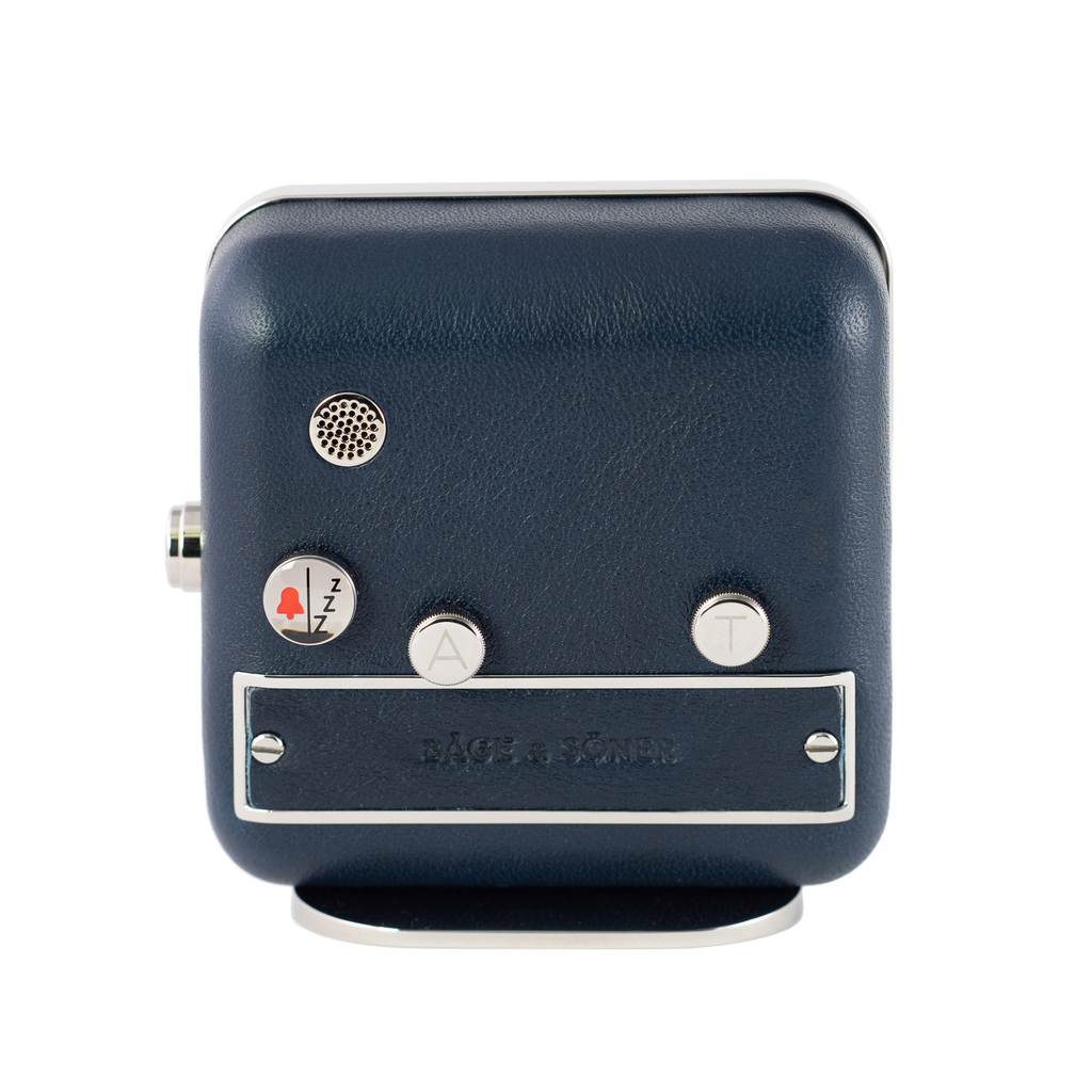 Rear view of 'Northern Lights' alarm clock, featuring polished stainless steel and a hint of blue leather