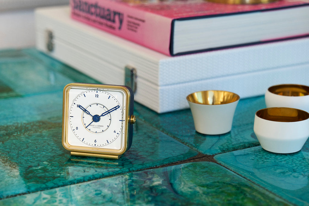 Sea Breeze' alarm clock on a light-toned surface, classic charm mingling with contemporary design